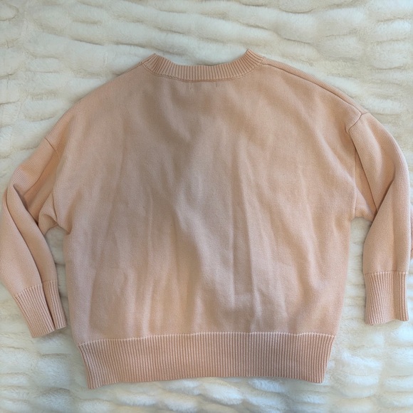 Relaxed Crewneck Sweater in Pale Peach - Picture 3 of 5